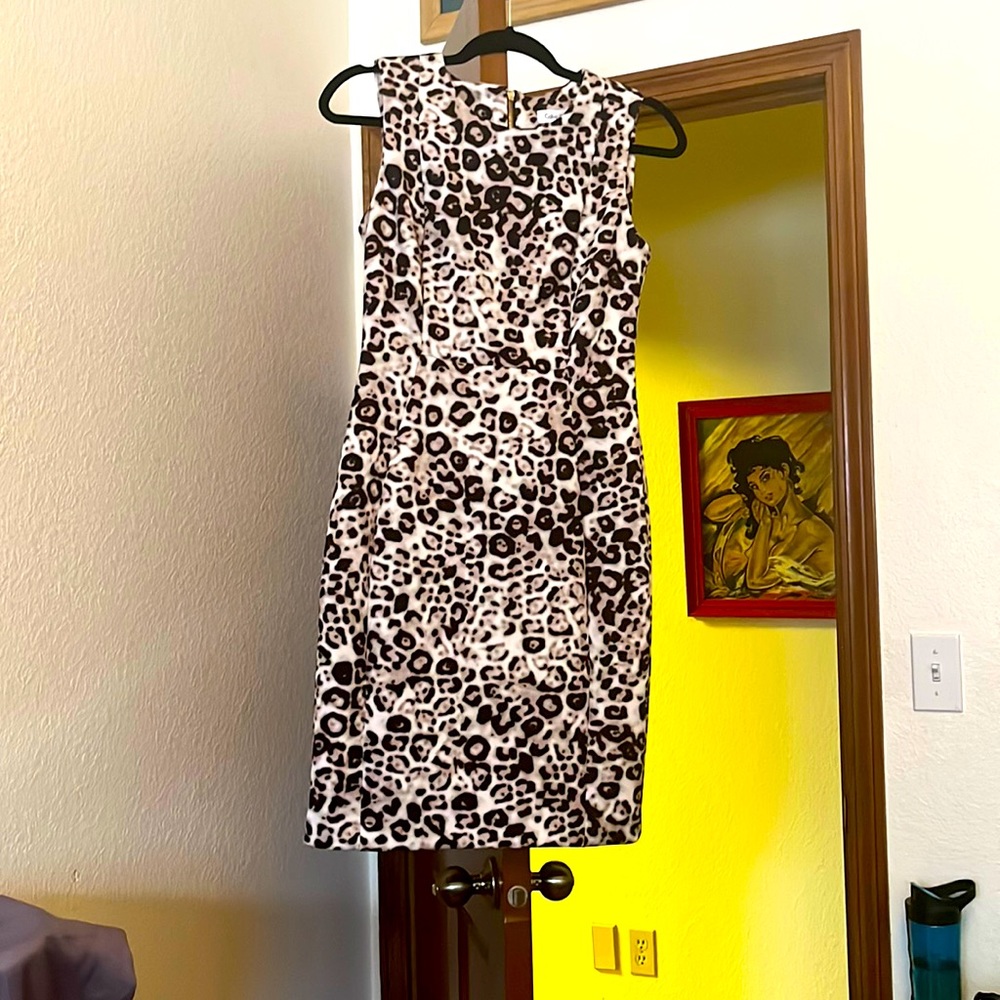 Never been worn. CALVIN KLEIN DRESS. Very nice thick, soft material.